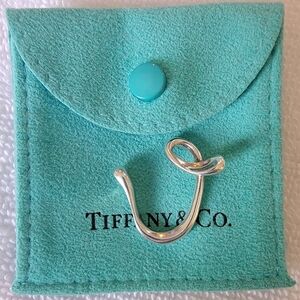 Authentic Tiffany & Co. Elsa Peretti. Silver V initial Pendant.